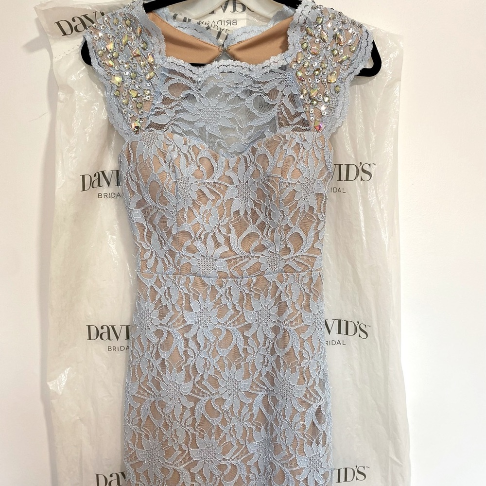 Never worn with tags David’s bridal dress.